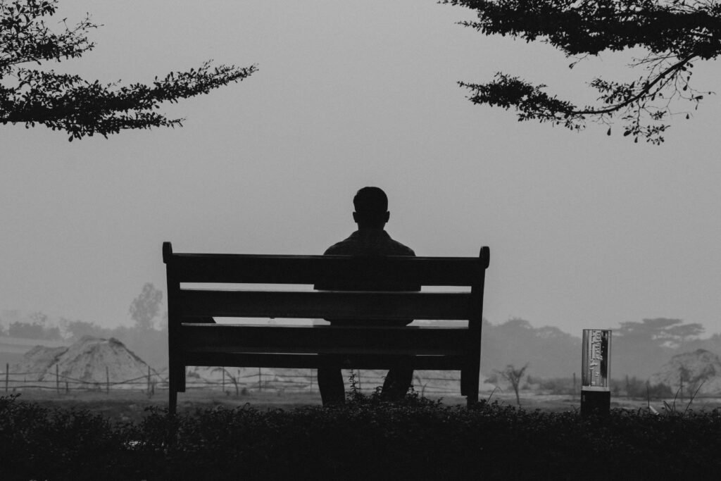 man sitting alone wondering what to do after what to do after discovering affair
