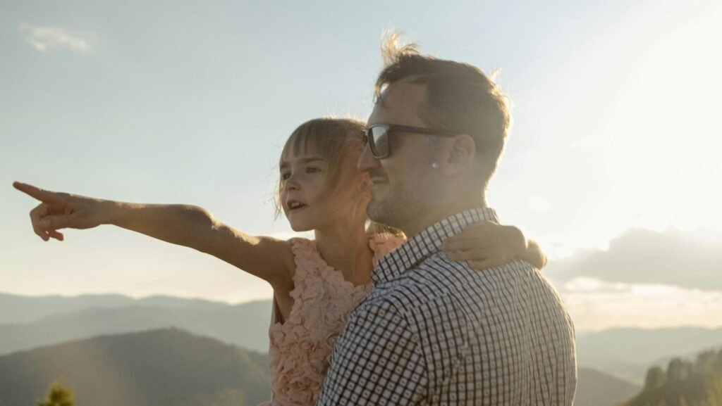father and daughter staring afar depicting how to be a good father after betrayal